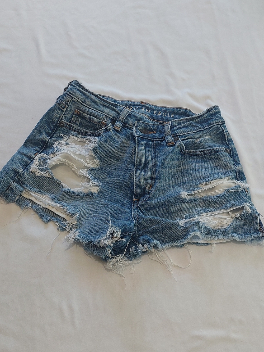 American Eagle Asymmetrical Waist .Size 00 Distressed